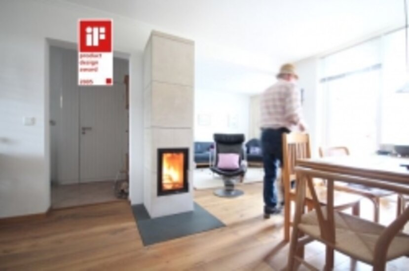 Design-prämierter Kleinspeicherofen mit Natursteinverkleidung